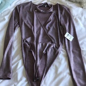 Never worn low cut body suit